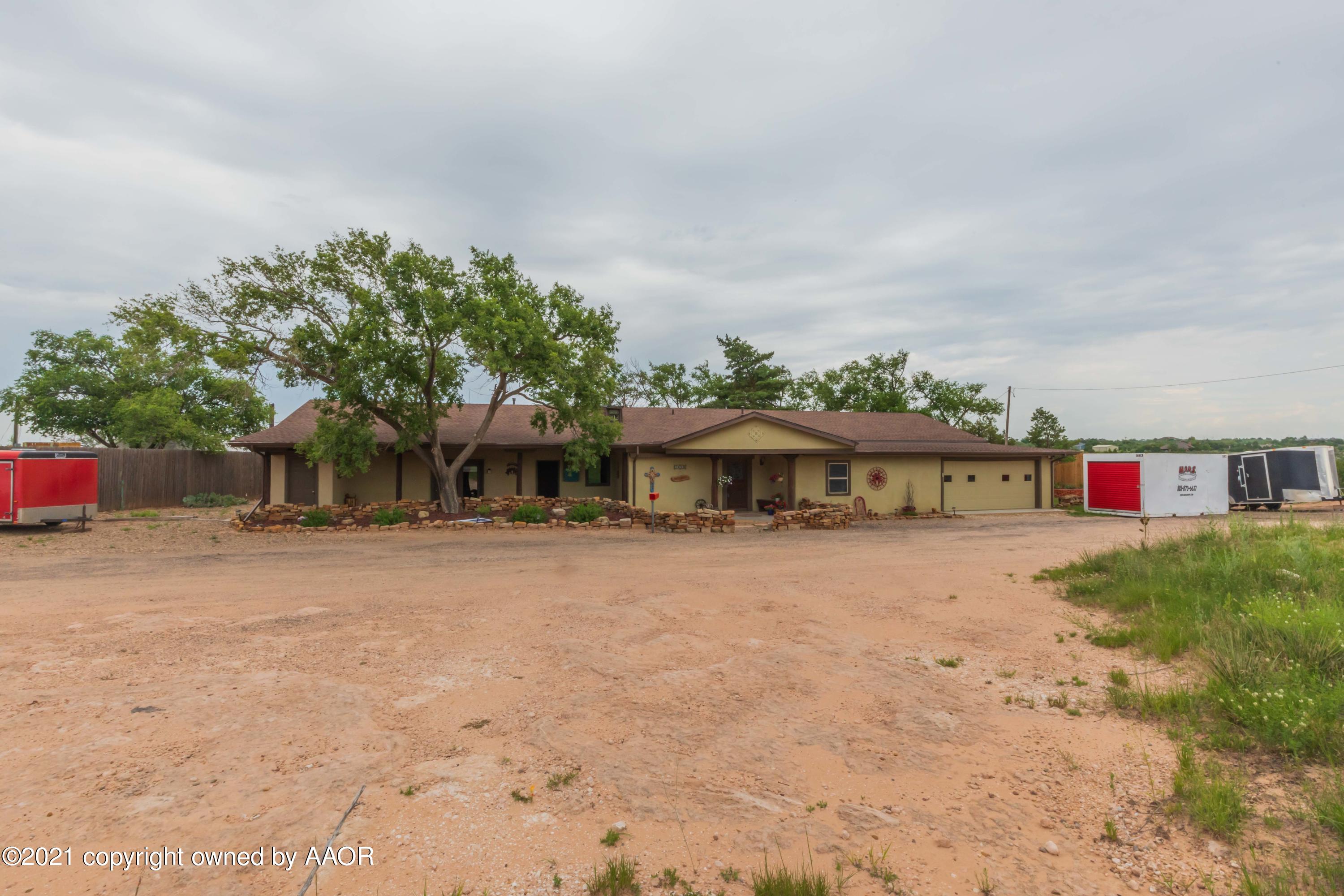 808 Craft Center Road Amarillo, TX 79118 - Photo 2 of 77 a front view of a house with a yard and garage