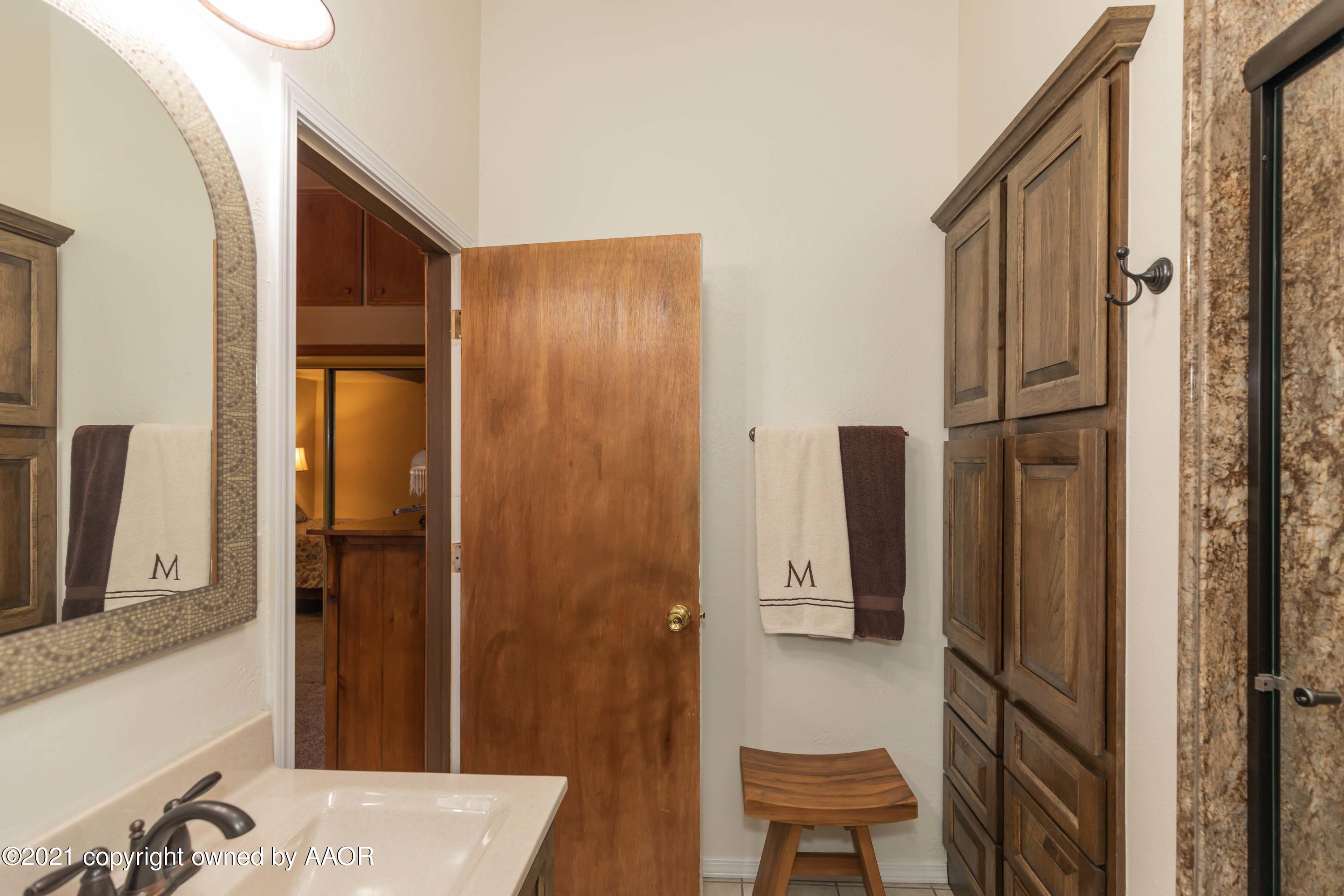808 Craft Center Road Amarillo, TX 79118 - Photo 32 of 77 a bathroom with a tub and a sink