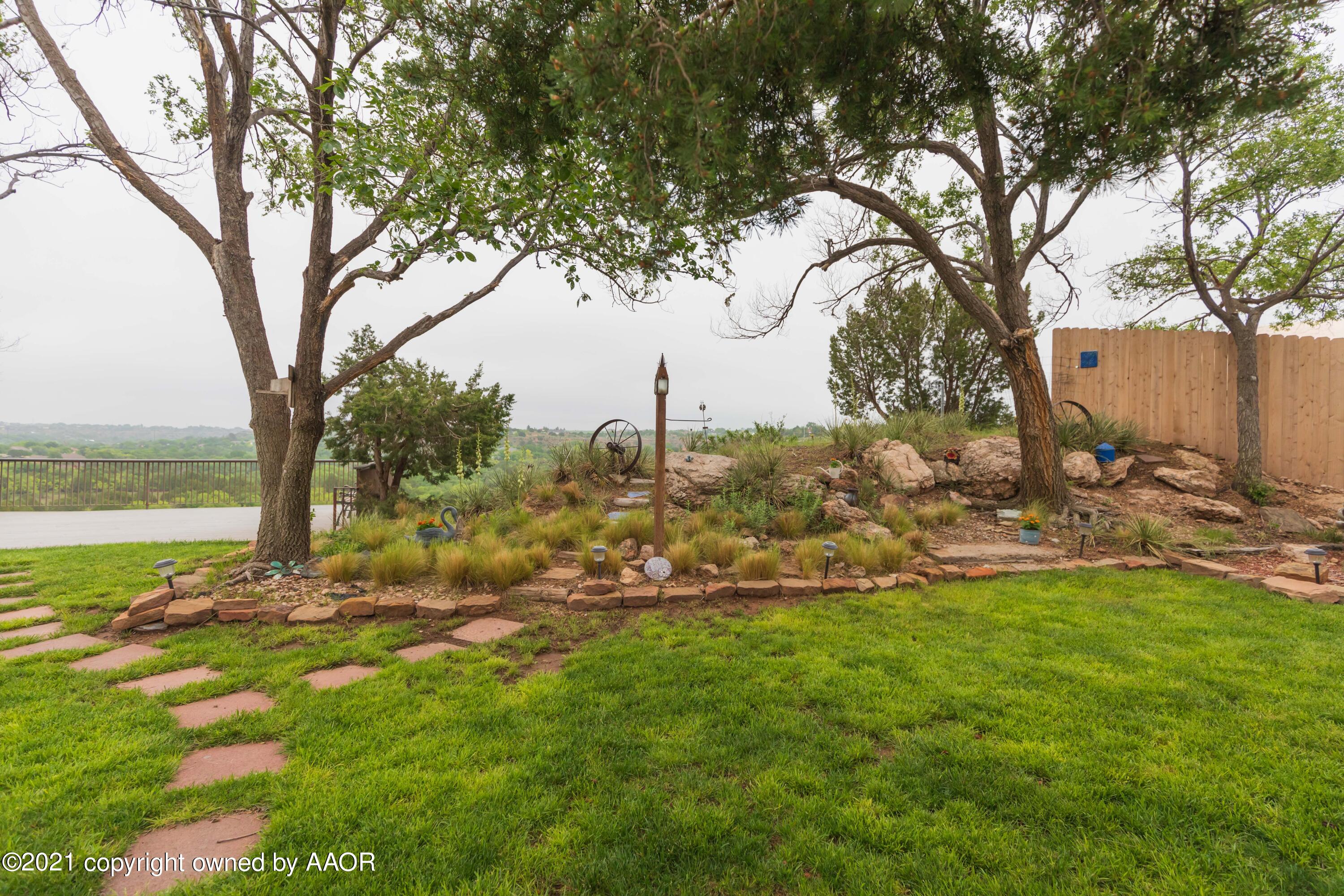 808 Craft Center Road Amarillo, TX 79118 - Photo 59 of 77 a view of a yard with an tree
