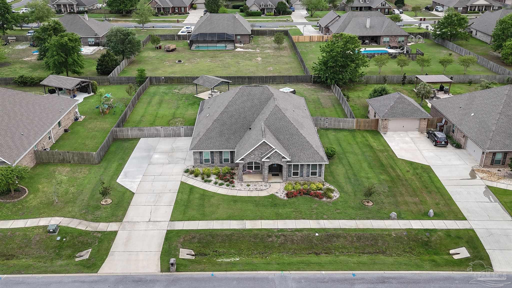 2759 Gemstone Circle Pace, FL 32571 - Photo 33 of 36 an aerial view of a house