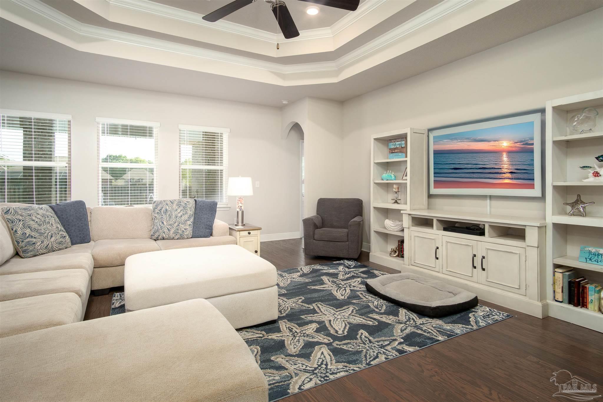 2759 Gemstone Circle Pace, FL 32571 - Photo 4 of 36 a living room with furniture and a large window