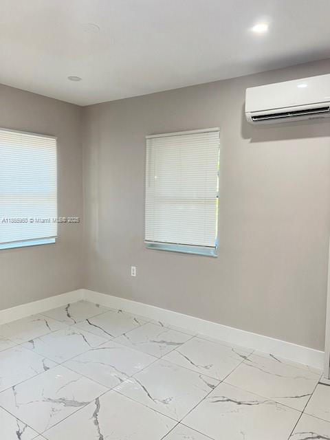 922 Northwest 2nd Street, Unit 4 Miami, FL 33128 - Photo 20 of 35 a view of a room that has a window in it