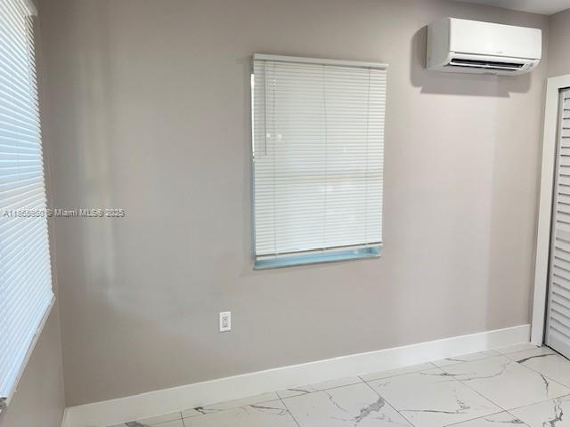 922 Northwest 2nd Street, Unit 4 Miami, FL 33128 - Photo 7 of 35 a view of a small space with a window