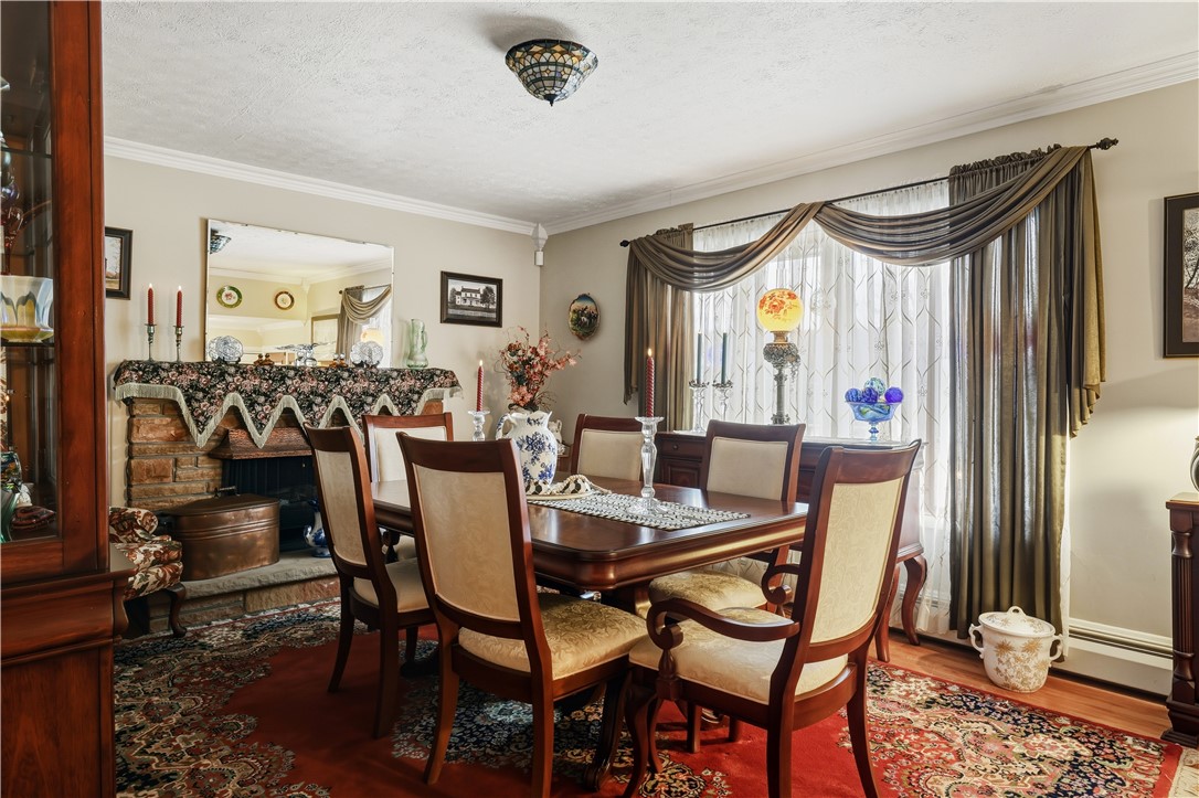 81 Rolling Acres Road Southport, NY 14871 - Photo 4 of 43 Dining room with gas fireplace
