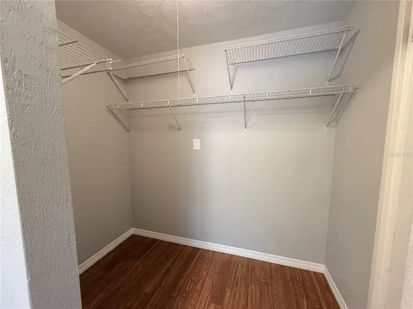 a view of an empty walk in closet