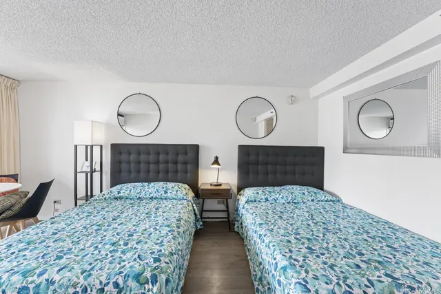 a bedroom with bed and a window