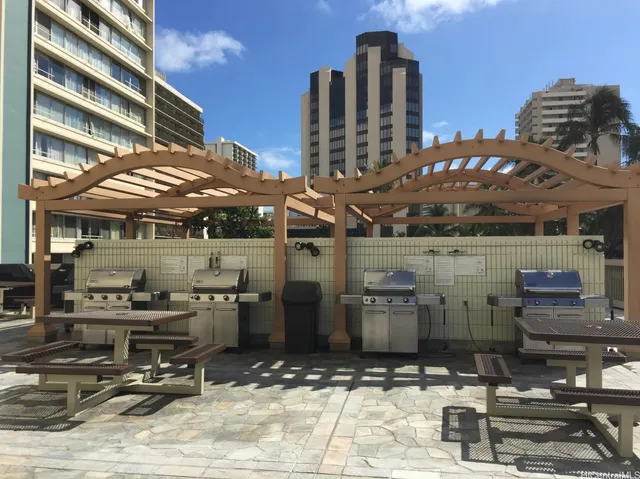 a view of a building with sitting area