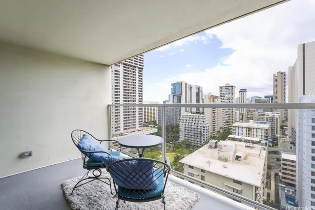 a outdoor living space with furniture and a floor to ceiling window