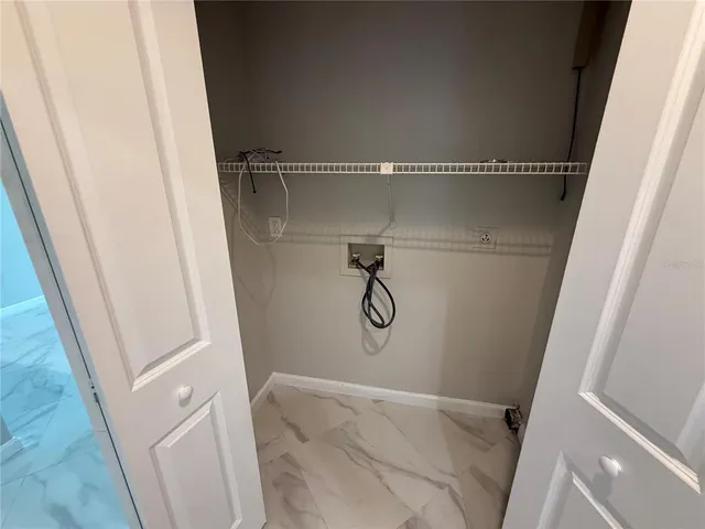 a bathroom with a shower and a toilet