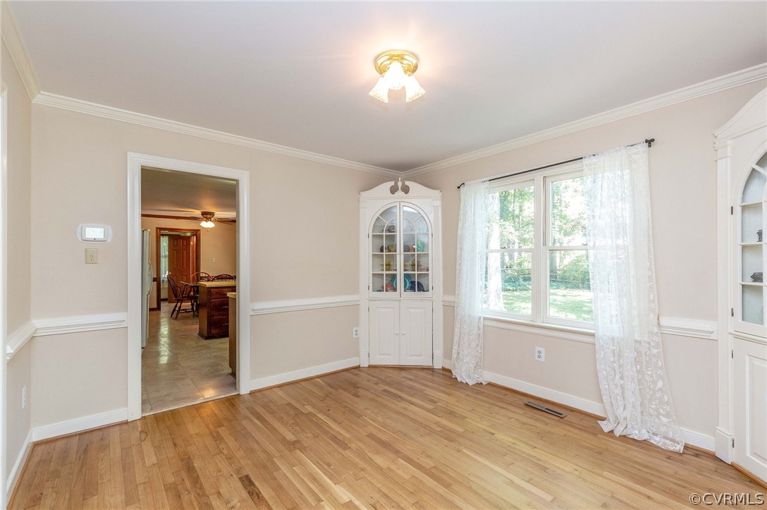13904 2 Notch Road Midlothian, VA 23112 - Photo 13 of 48 a view of empty room with wooden floor and fan