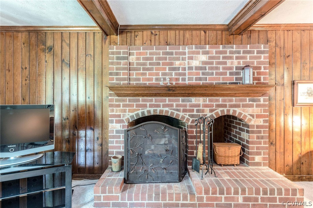 13904 2 Notch Road Midlothian, VA 23112 - Photo 16 of 48 a living room with fireplace furniture and a flat screen tv
