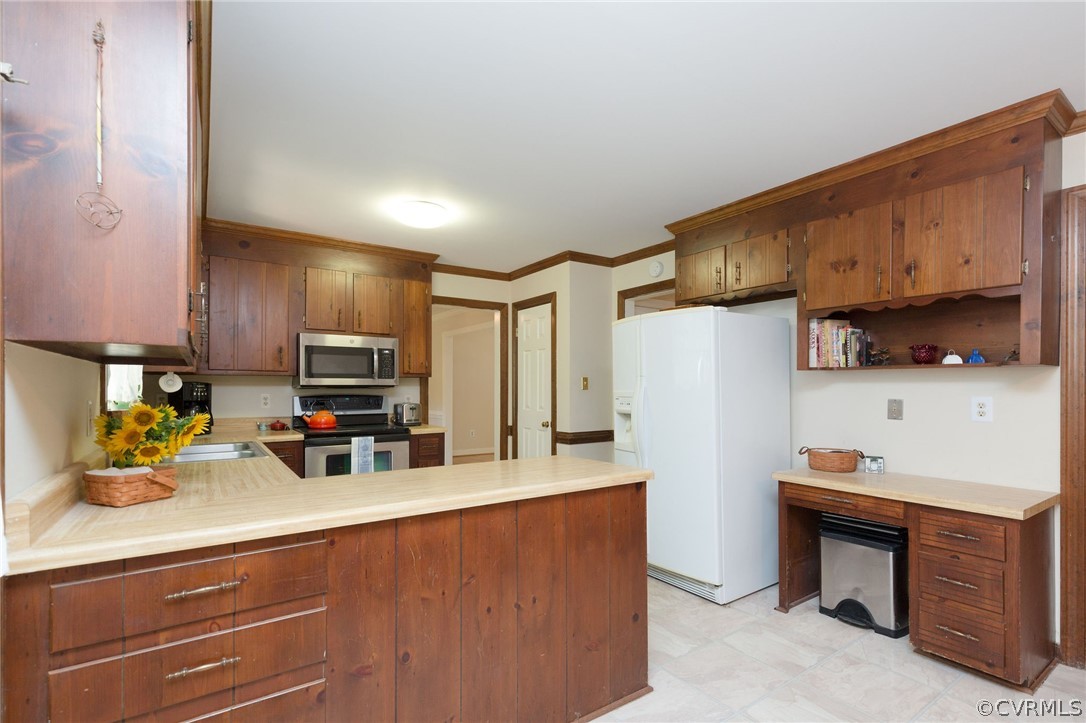 13904 2 Notch Road Midlothian, VA 23112 - Photo 19 of 48 a kitchen with stainless steel appliances a refrigerator sink and microwave