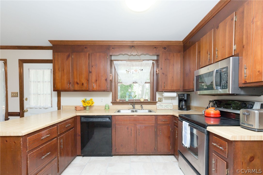 13904 2 Notch Road Midlothian, VA 23112 - Photo 20 of 48 a kitchen with a sink a stove and cabinets