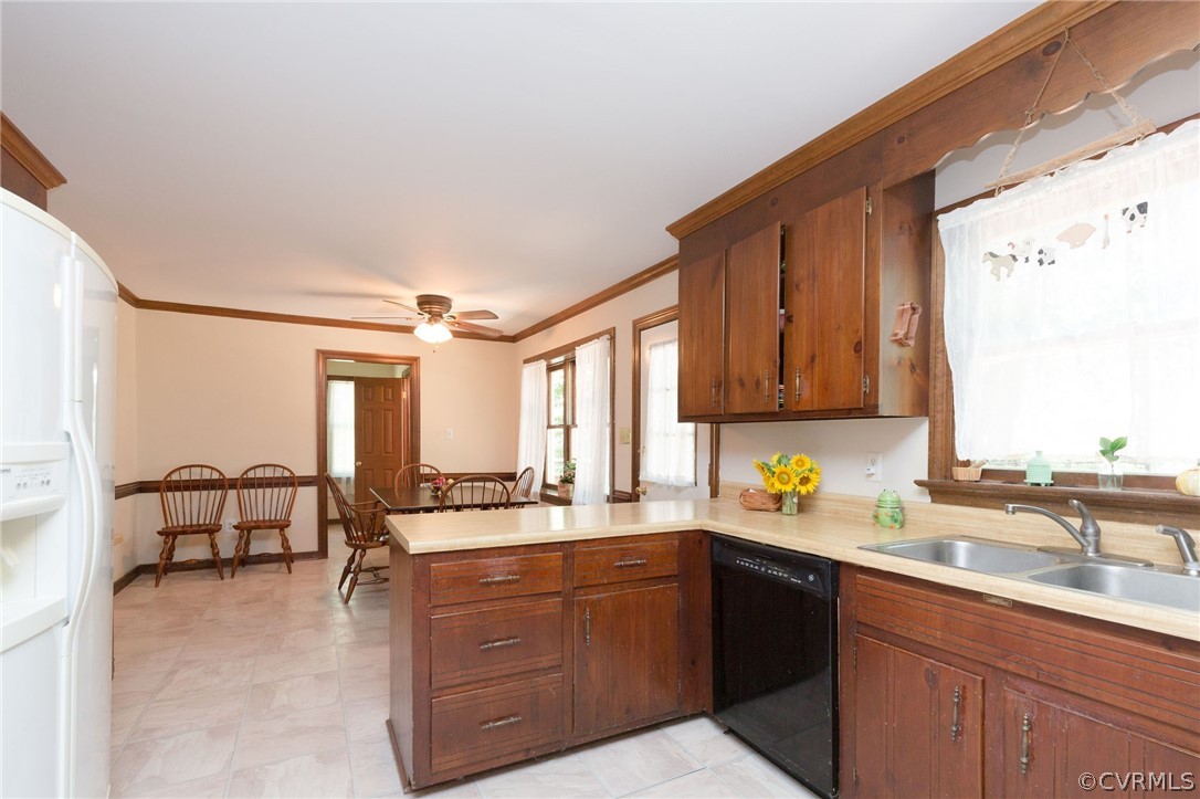13904 2 Notch Road Midlothian, VA 23112 - Photo 21 of 48 a kitchen with a sink and cabinets