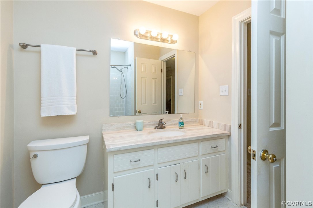 13904 2 Notch Road Midlothian, VA 23112 - Photo 38 of 48 a bathroom with a toilet sink and mirror