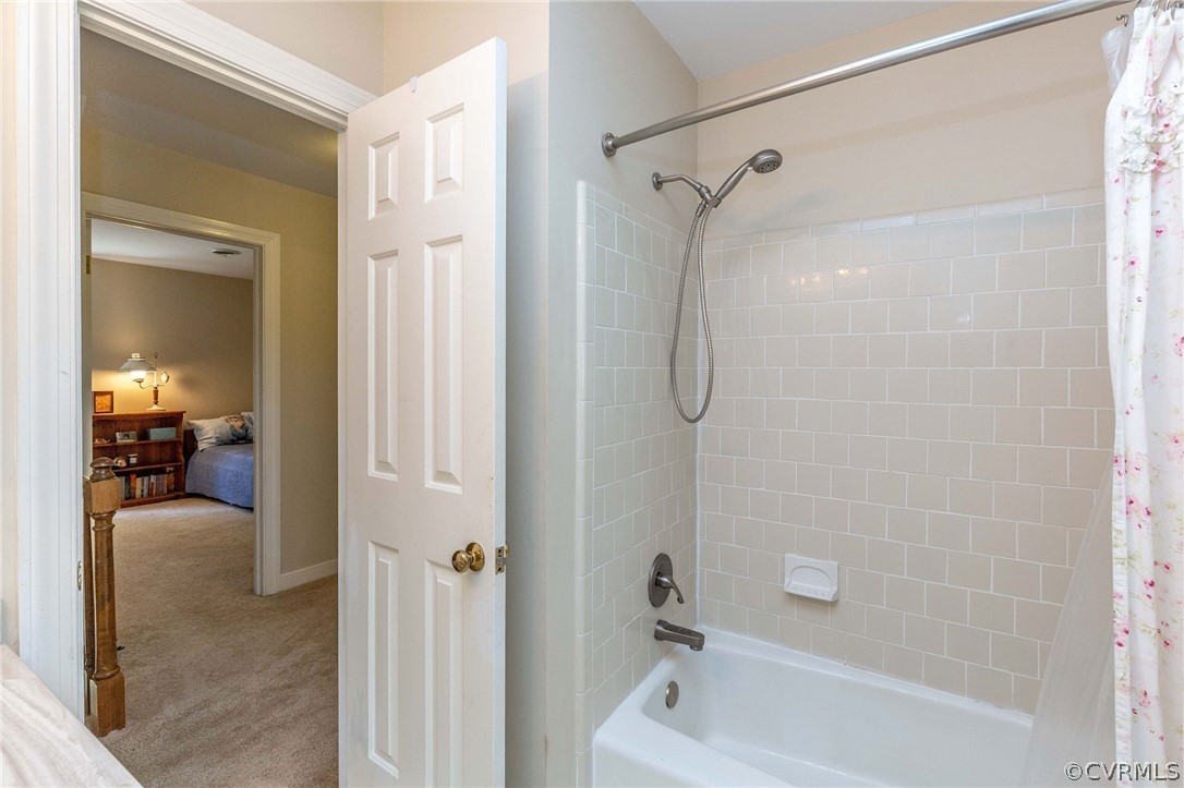13904 2 Notch Road Midlothian, VA 23112 - Photo 39 of 48 a bathroom with a glass shower door
