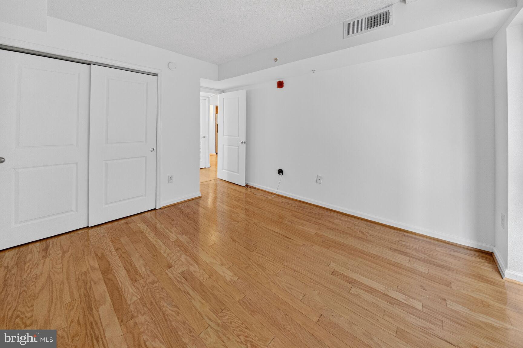 7923 Eastern Avenue Northwest, Unit 404 Silver Spring, MD 20910 - Photo 14 of 18 a view of an empty room