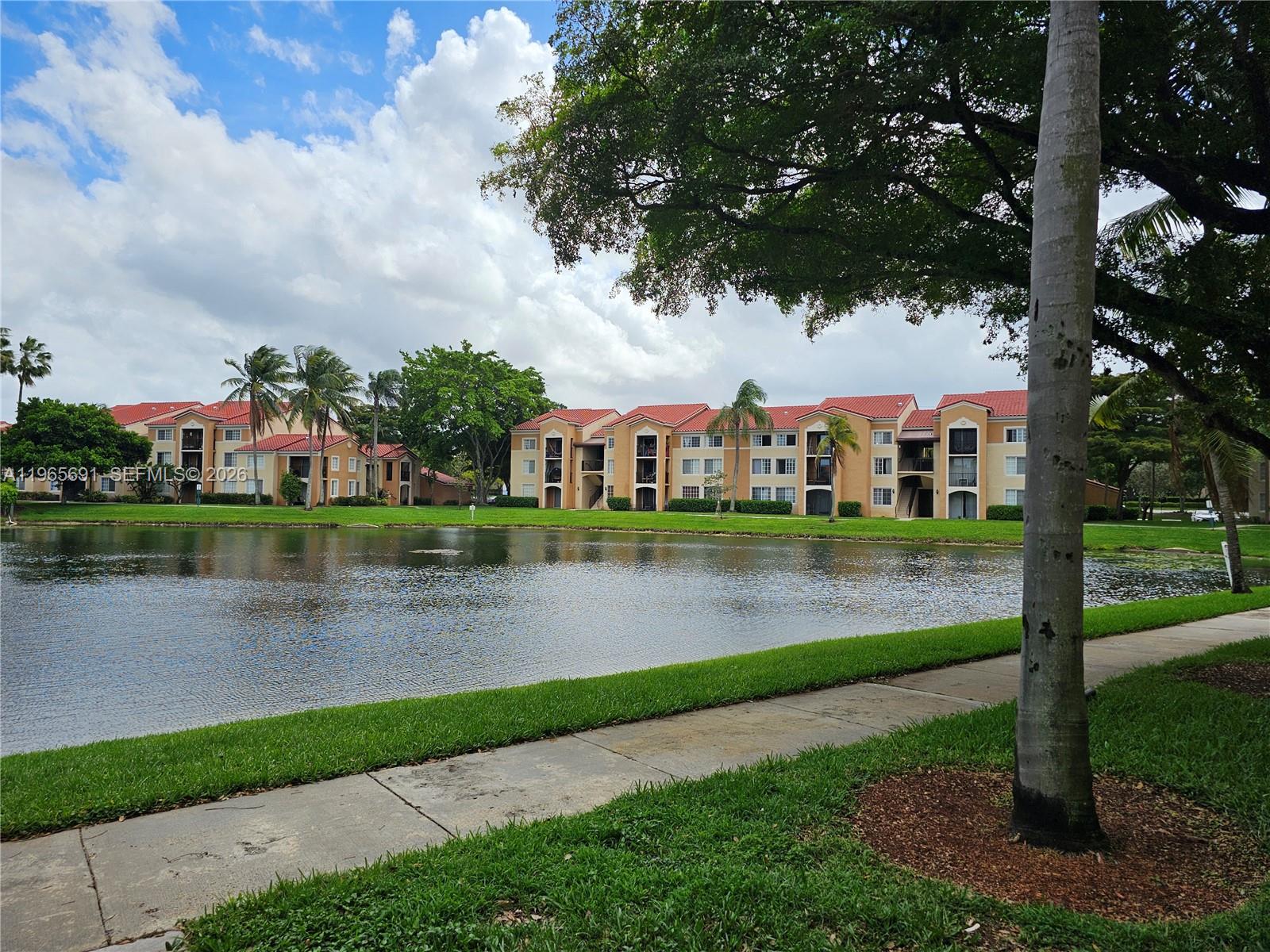 2051 Renaissance Boulevard, Unit 104 Miramar, FL 33025 - Photo 11 of 39 a view of lake
