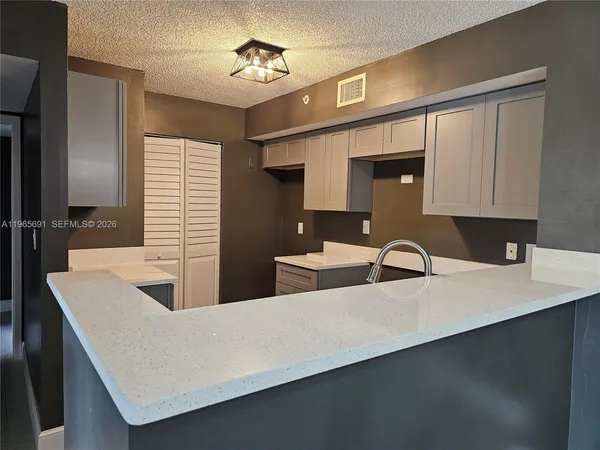 a view of an entryway with a livingroom