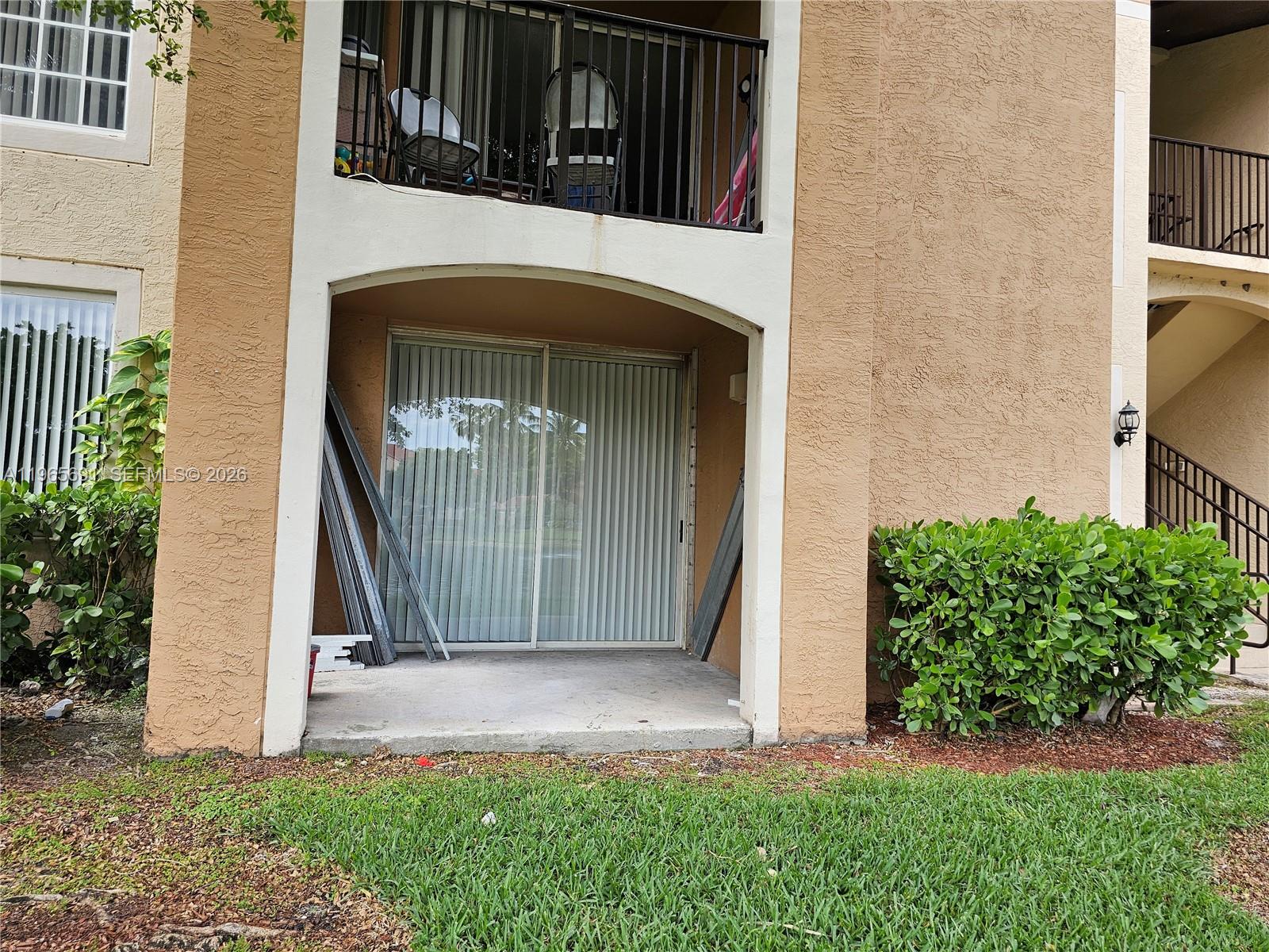2051 Renaissance Boulevard, Unit 104 Miramar, FL 33025 - Photo 37 of 39 a view of front door of house