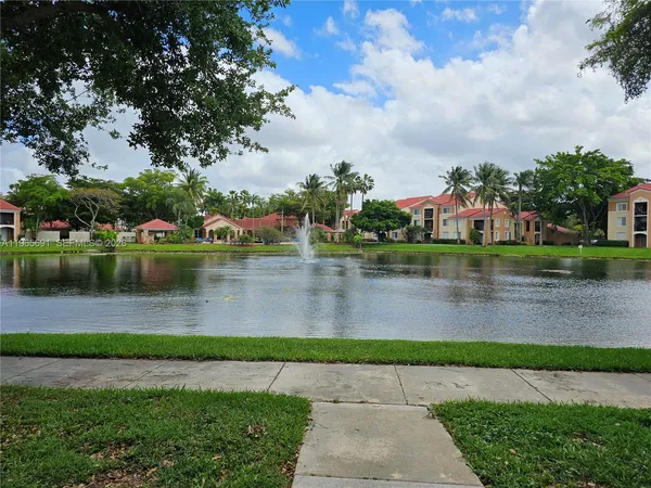 a view of a lake with houses