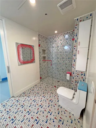 a bathroom with a sink and a shower
