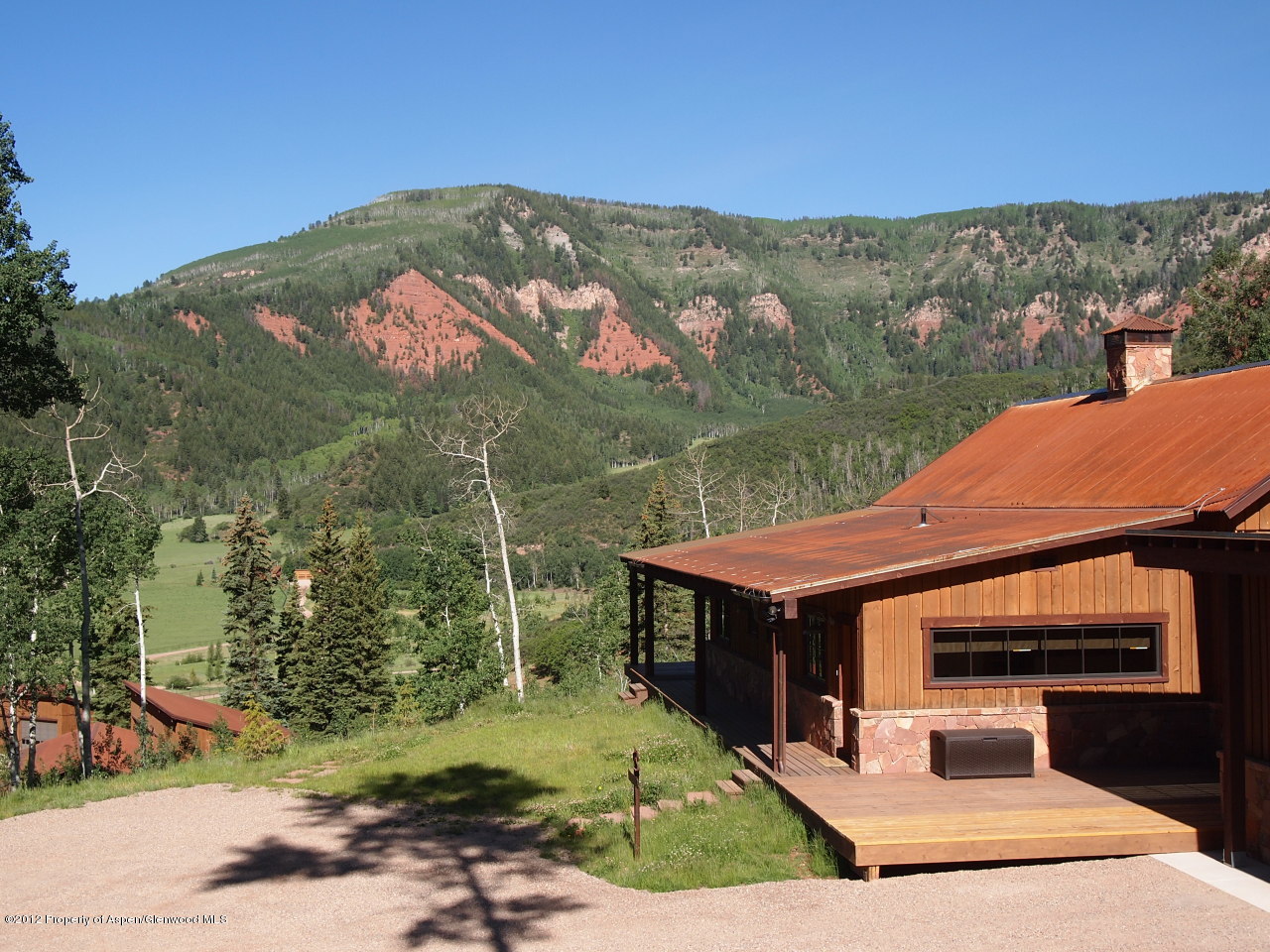 2900 Taylor Creek Road Basalt, CO 81621 - Photo 13 of 39 a view of a terrace with a yard