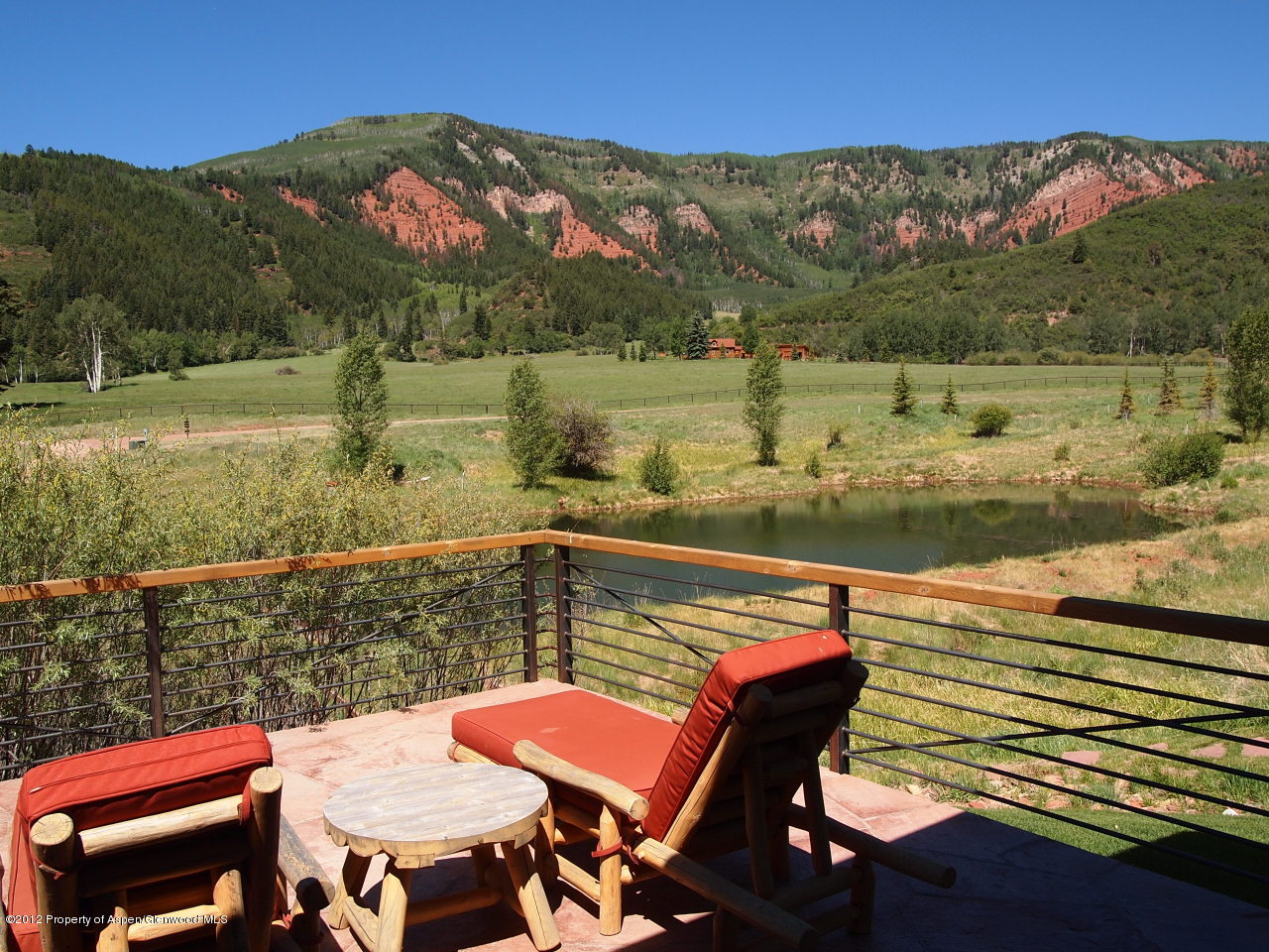 2900 Taylor Creek Road Basalt, CO 81621 - Photo 25 of 39 a view of a chairs and table in the patio