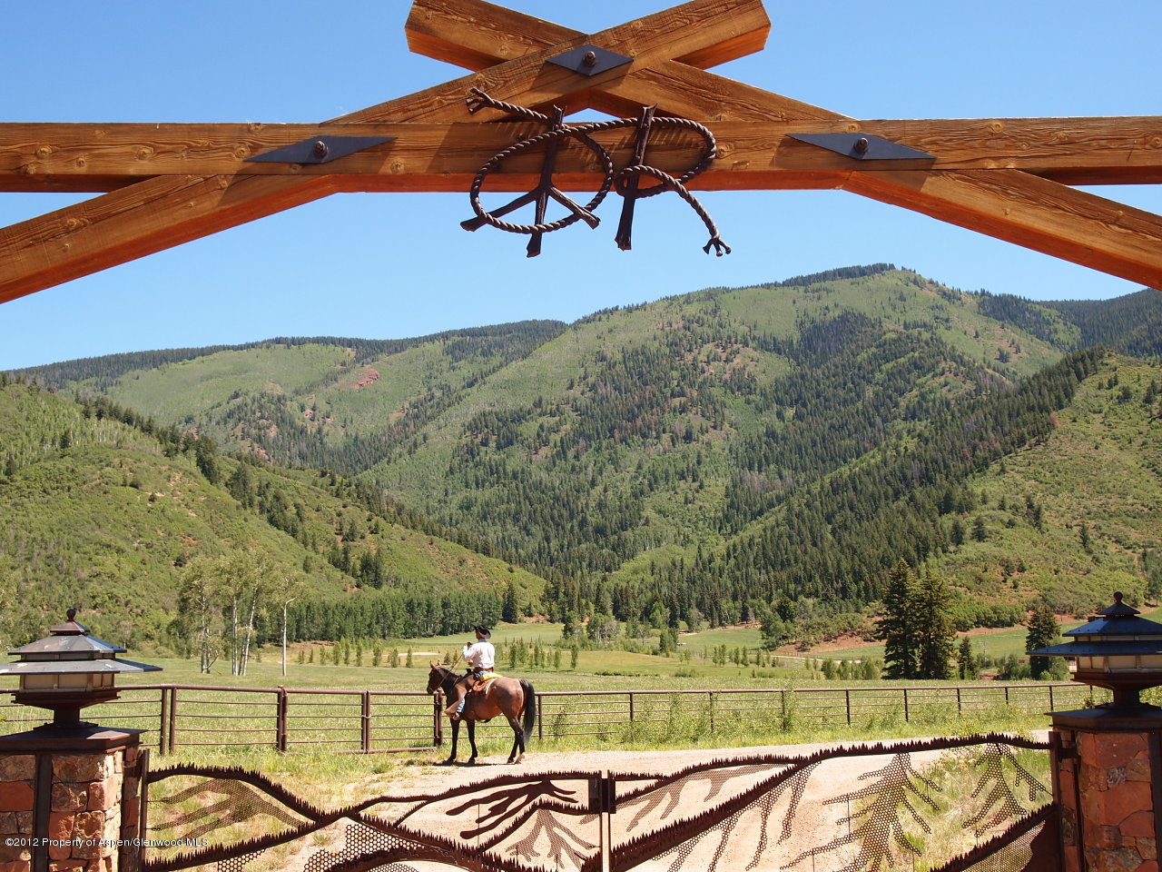 2900 Taylor Creek Road Basalt, CO 81621 - Photo 3 of 39 a view of a swimming pool with an outdoor seating