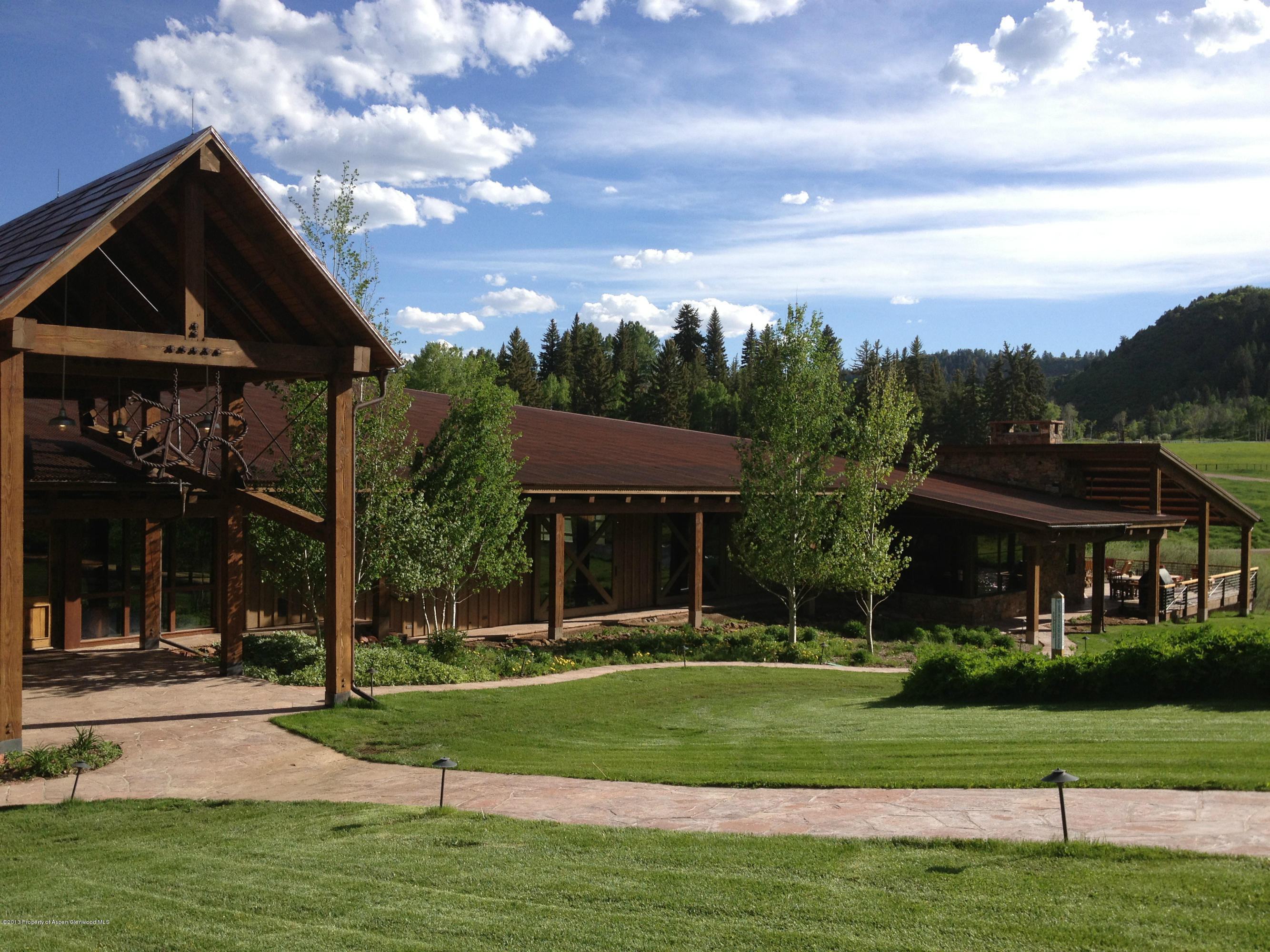 2900 Taylor Creek Road Basalt, CO 81621 - Photo 38 of 39 a view of a big house in a big yard with large tree
