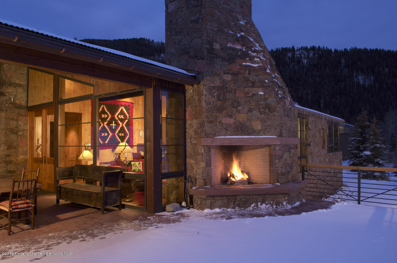 2900 Taylor Creek Road Basalt, CO 81621 - Photo 7 of 39 a view of an empty room with a fireplace