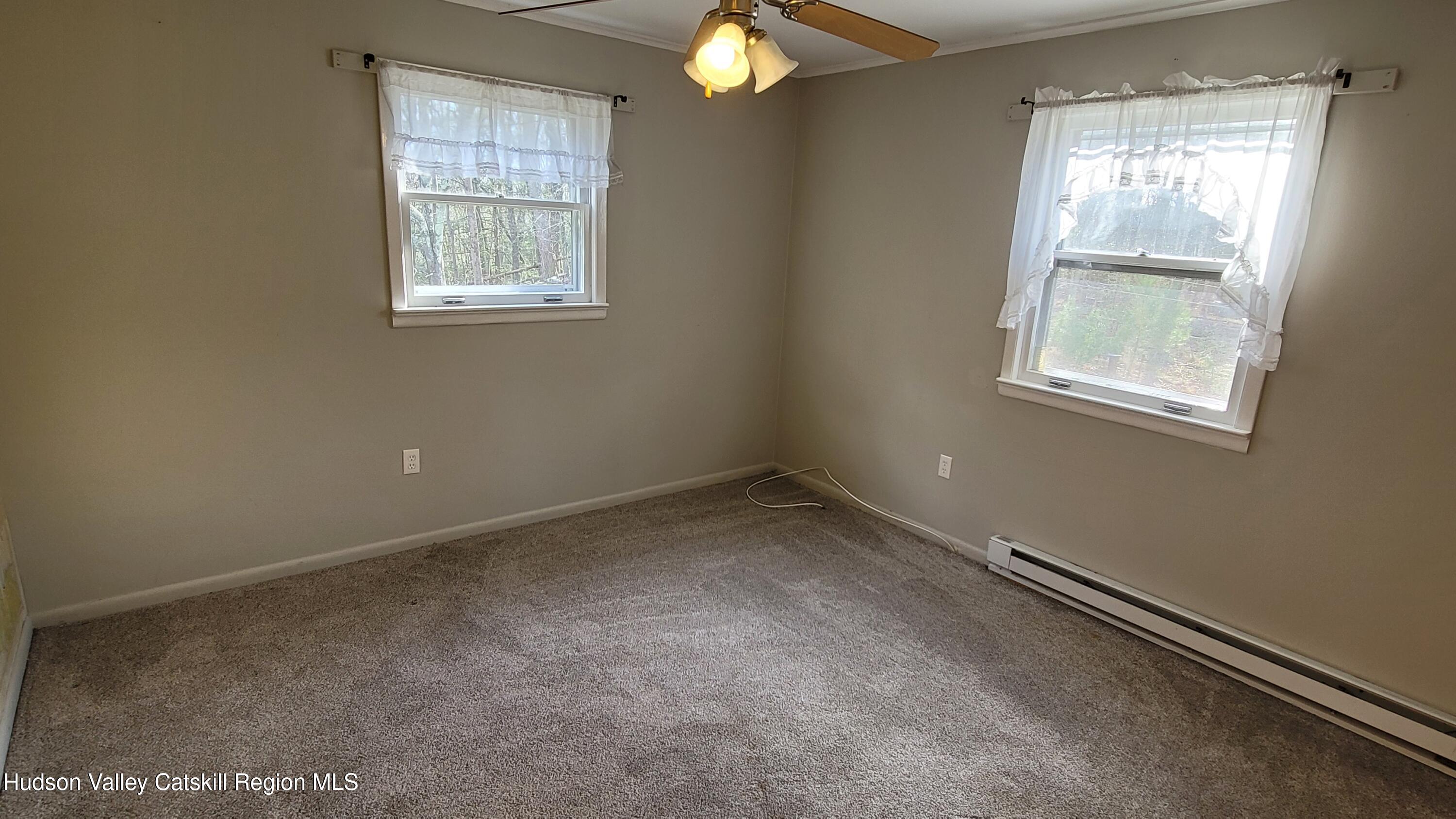 97 Ruby Road Kingston, NY 12401 - Photo 20 of 25 an empty room with windows