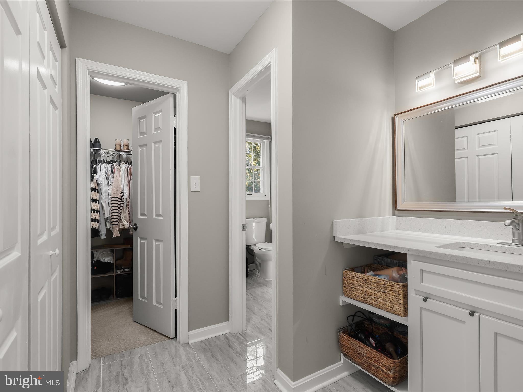 6147 Campfire Columbia, MD 21045 - Photo 29 of 59 Primary vanity / dressing area & walk-in closet
