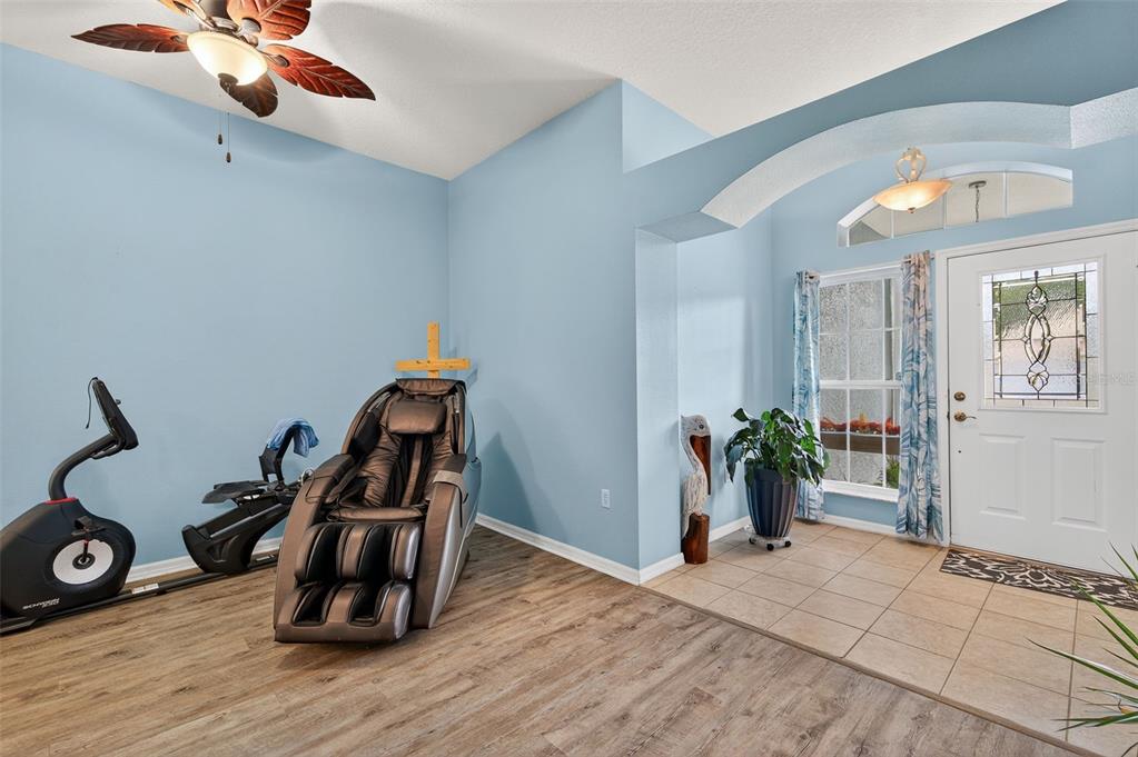 11501 Bloomington Court New Port Richey, FL 34654 - Photo 34 of 71 a view of workspace with wooden floor and gym equipment