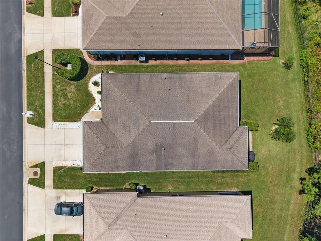 11501 Bloomington Court New Port Richey, FL 34654 - Photo 63 of 71 an aerial view of a house with a yard