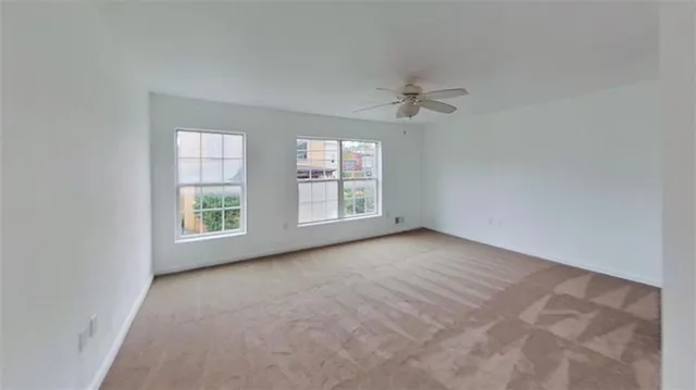 an empty room with windows