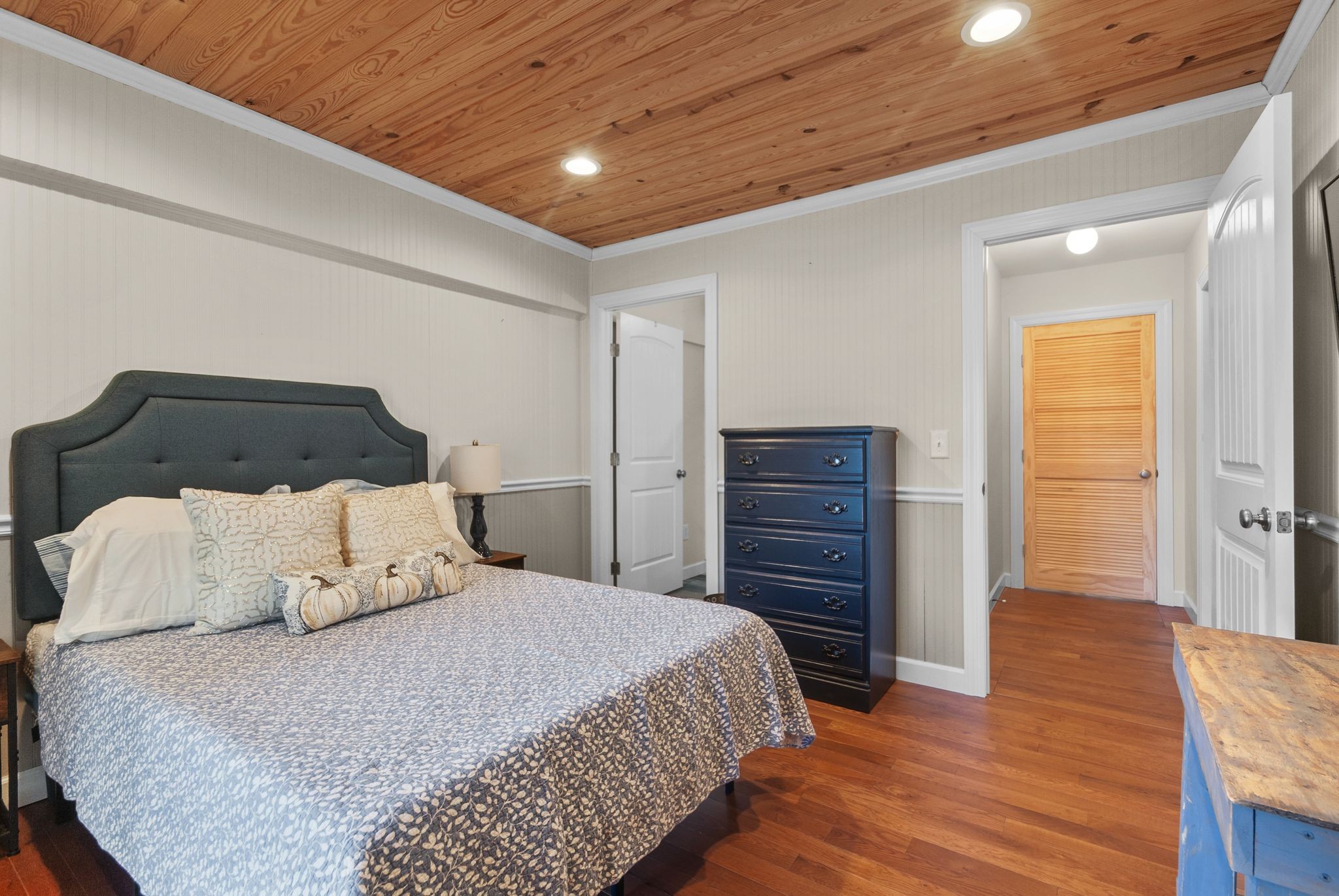 415 South Ingram Street Pulaski, TN 38478 - Photo 15 of 33 a bedroom with a bed and wooden floor