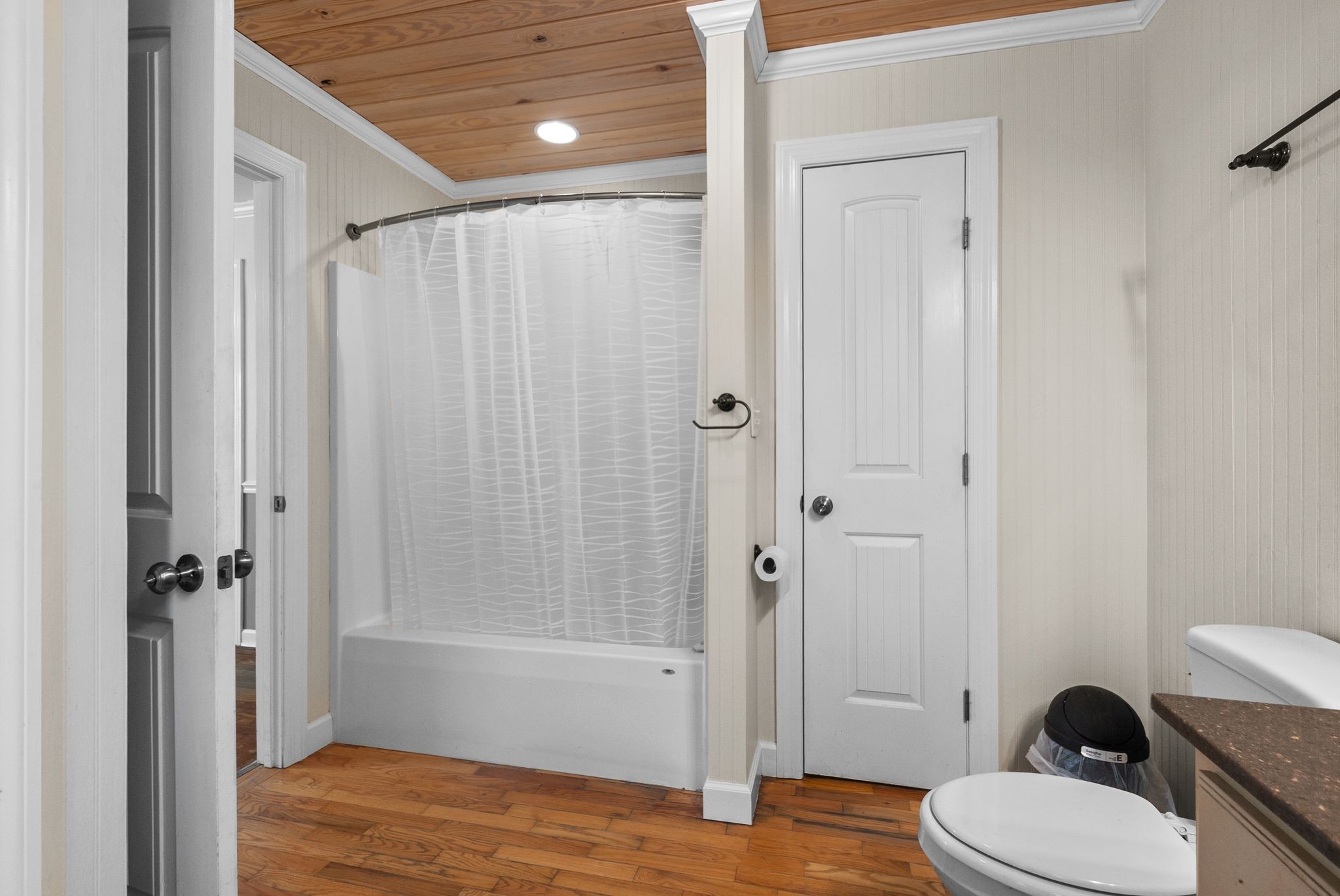 415 South Ingram Street Pulaski, TN 38478 - Photo 19 of 33 a bathroom with a granite countertop shower and a toilet