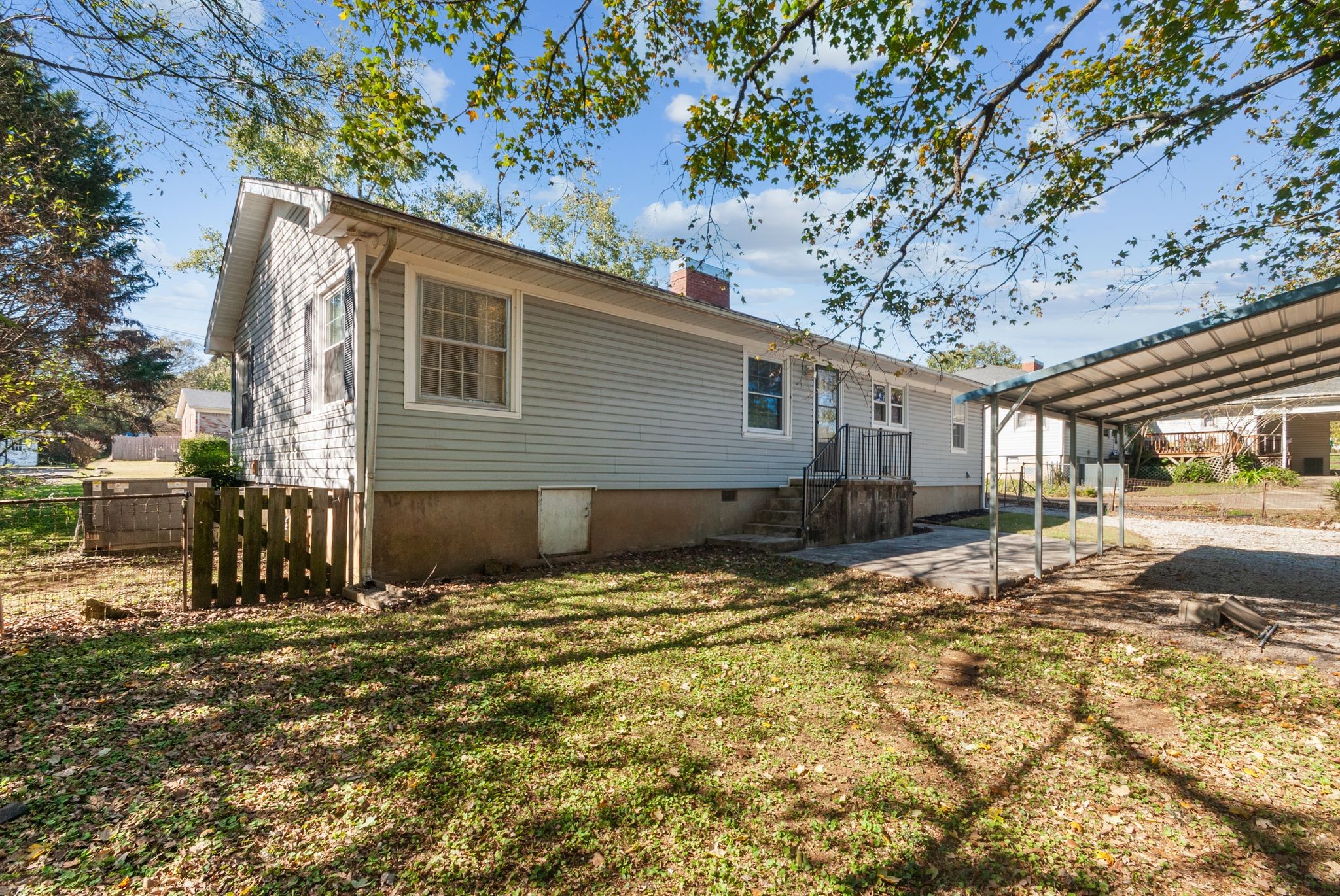 415 South Ingram Street Pulaski, TN 38478 - Photo 28 of 33 a view of house with backyard and tree in the background