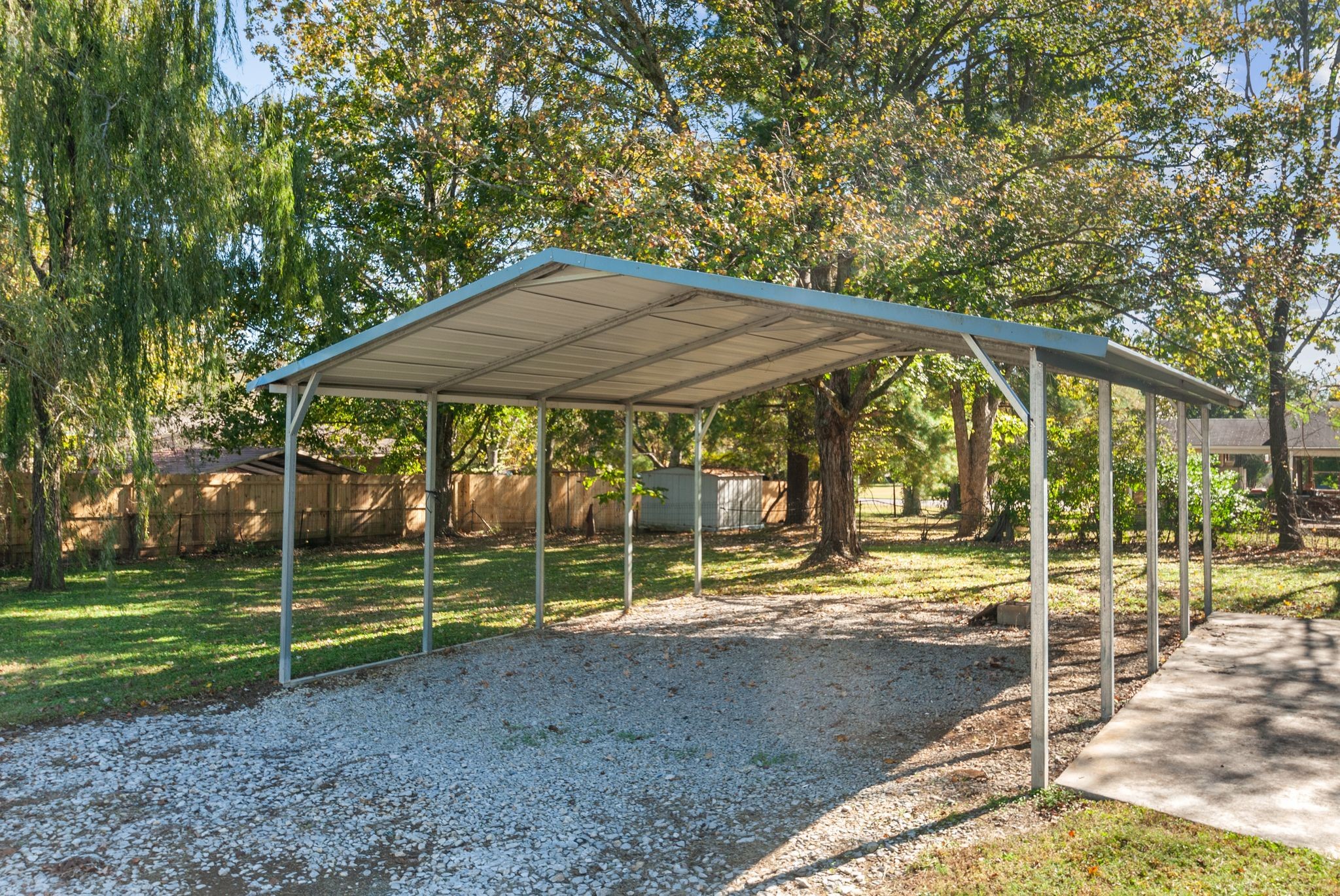 415 South Ingram Street Pulaski, TN 38478 - Photo 30 of 33 a backyard of a house with barbeque oven table and chairs