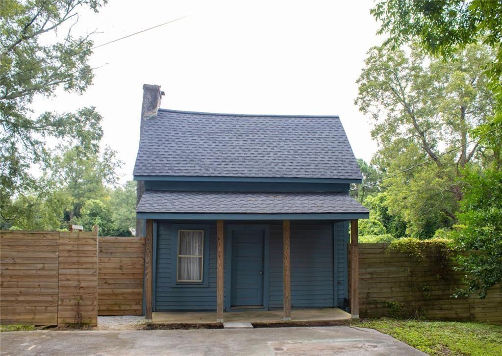 311 Stokes Street Monroe, GA 30655 - Photo 1 of 1 a front view of a house with garage