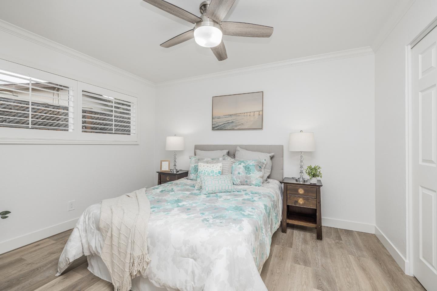 756 Acorn Court San Ramon, CA 94583 - Photo 17 of 33 a bedroom with a bed and a chandelier