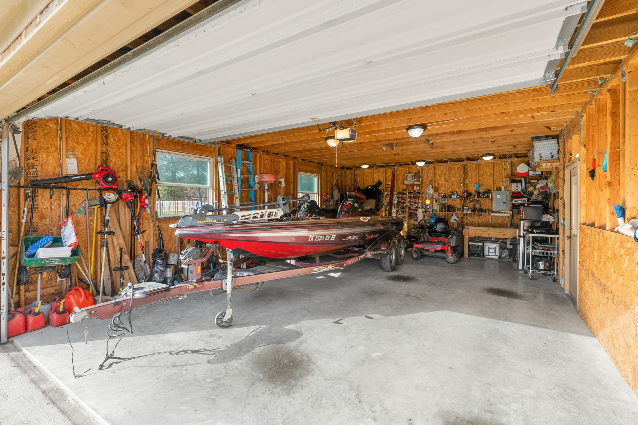 28503 Riverside Crest Lane Houston, TX 77336 - Photo 45 of 50 Garage is plenty big for a boat, cars, toys 30' x 30' (8' tall door by 16.5' wide)