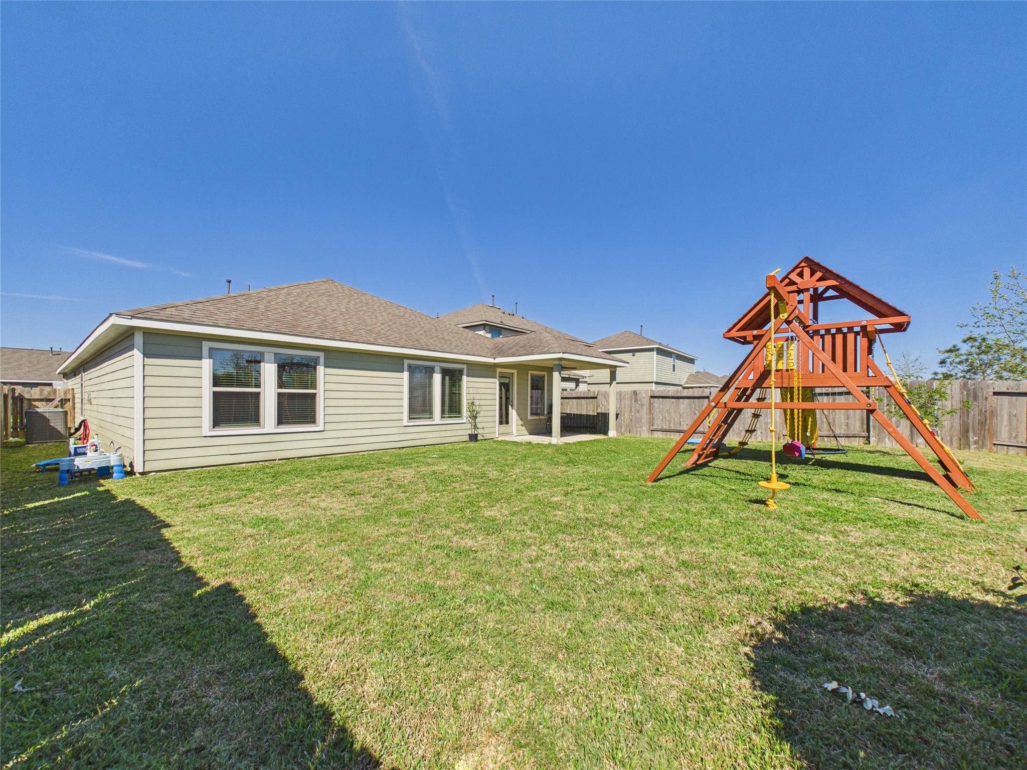 1237 Steed Bluff Drive Alvin, TX 77511 - Photo 42 of 50 a view of a house with a yard