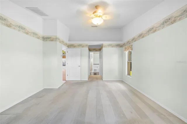 a bathroom with a double vanity sink a mirror and a shower