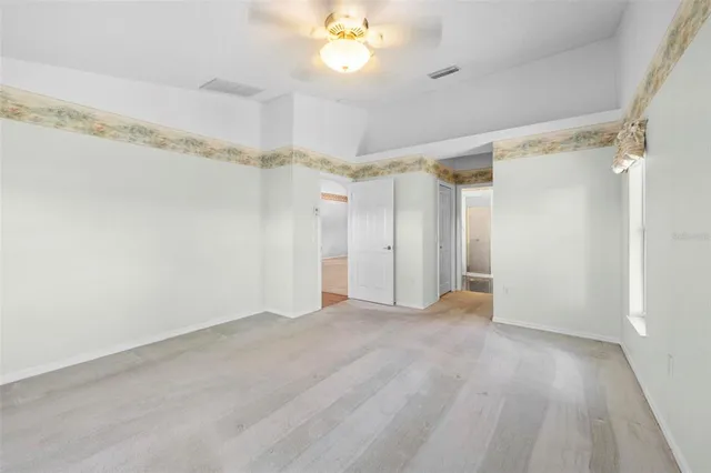 a bathroom with a bathtub and a toilet