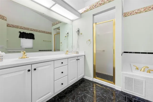 a view of hallway with wooden floor