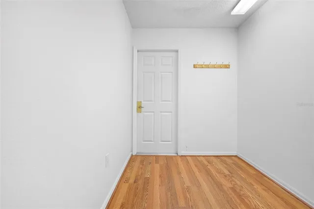 a view of swimming pool with outdoor seating and city view