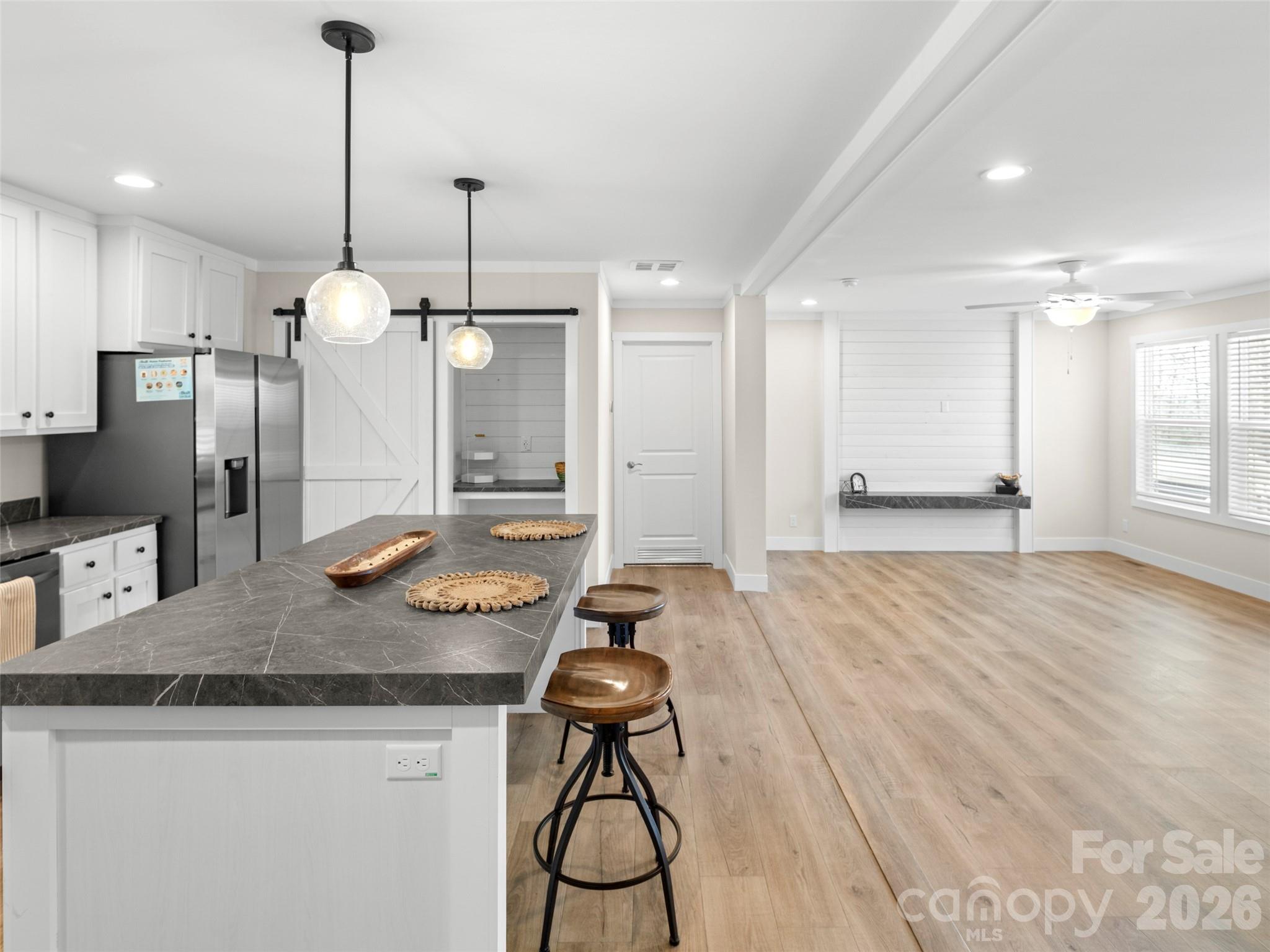 512 Hutch Mountain Road Fletcher, NC 28732 - Photo 5 of 23 a kitchen with stainless steel appliances granite countertop a stove a sink and a refrigerator
