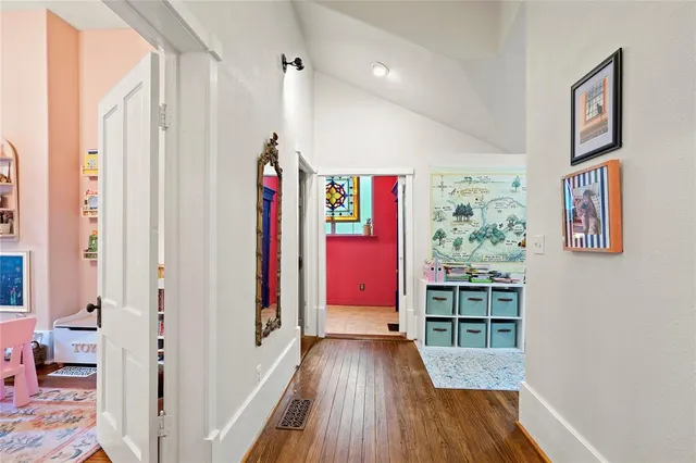 a view of front door with wooden floor